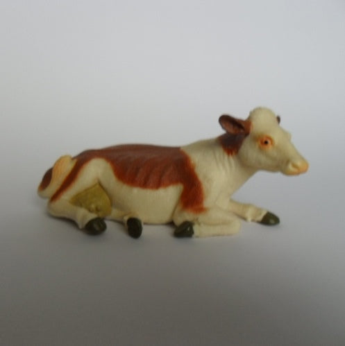 Dieren Koe bruin liggend